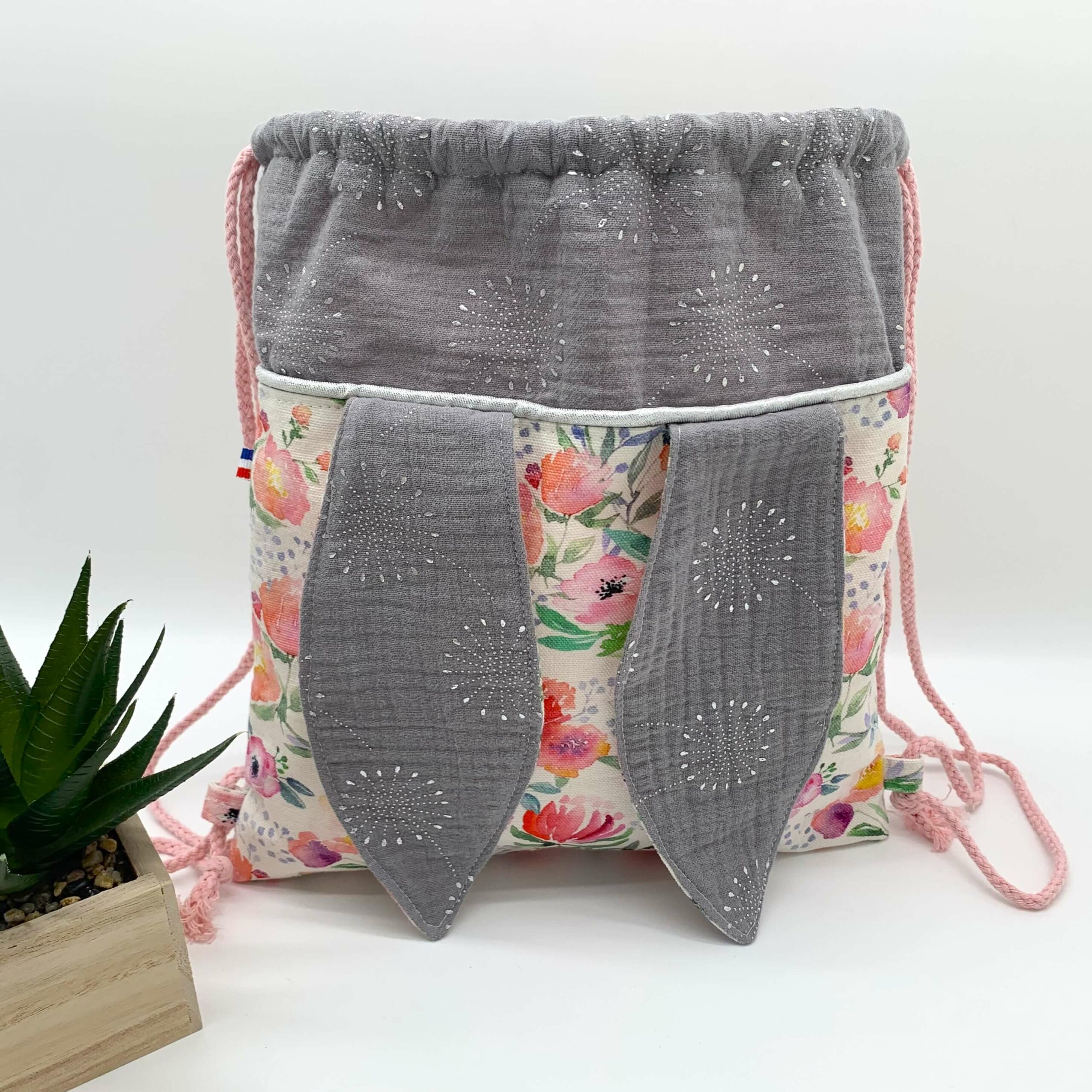 Sac à dos lapin rose et gris face ouvert